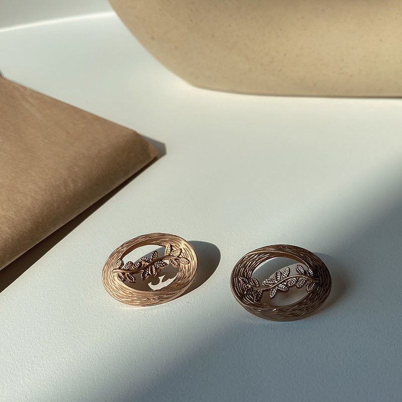 Hollow Leaf Shell Metal Button Trench Coat