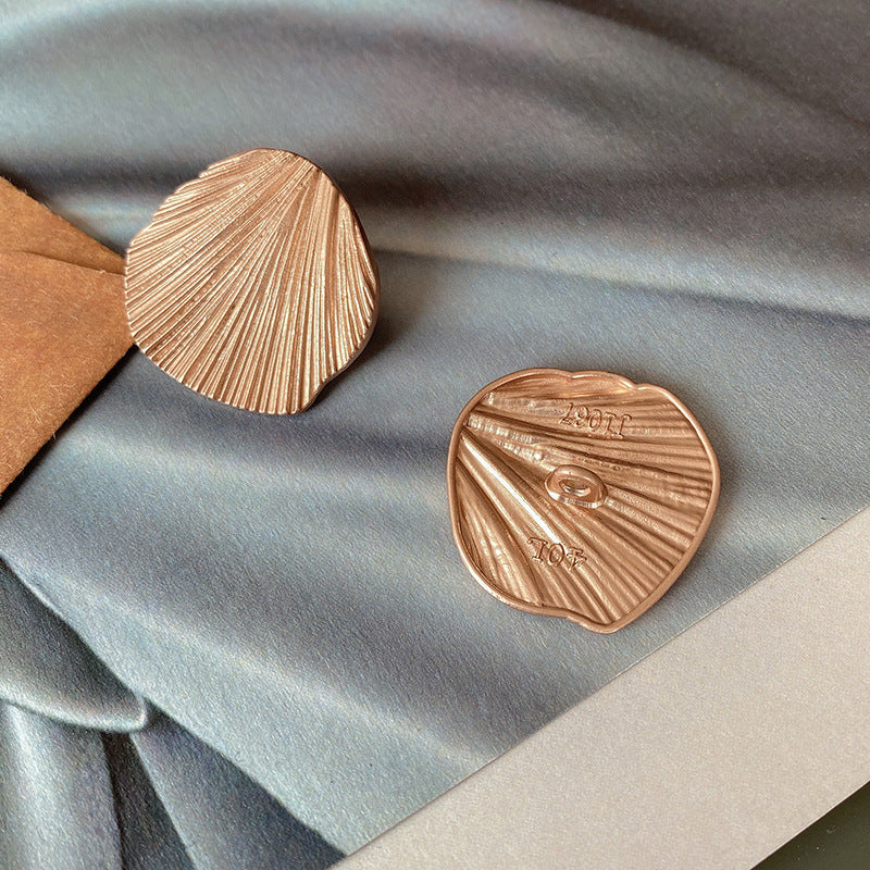 Hollow Leaf Shell Metal Button Trench Coat