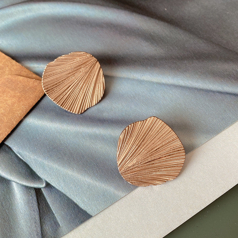 Hollow Leaf Shell Metal Button Trench Coat