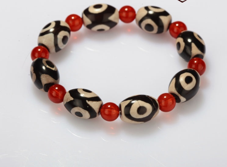 Three-Eyed Dzi Bead Red Agate Bracelet