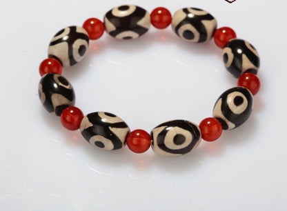 Three-Eyed Dzi Bead Red Agate Bracelet