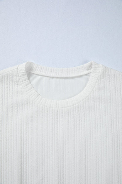 Solid Textured Drop Shoulder Peplum Top