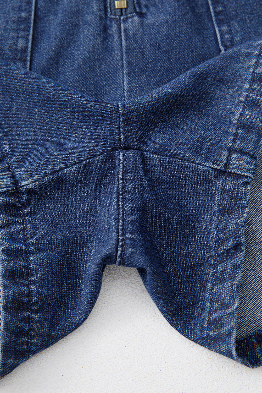 Denim Ruffle Zip Front Belted Romper