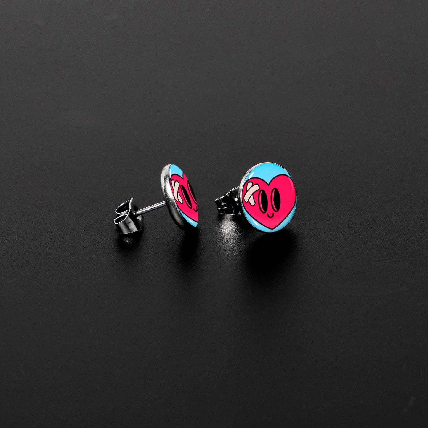Heartbreak Bandaged Heart Stud Earrings by Onyx O