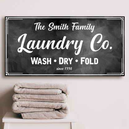 Family Laundry Company Sign
