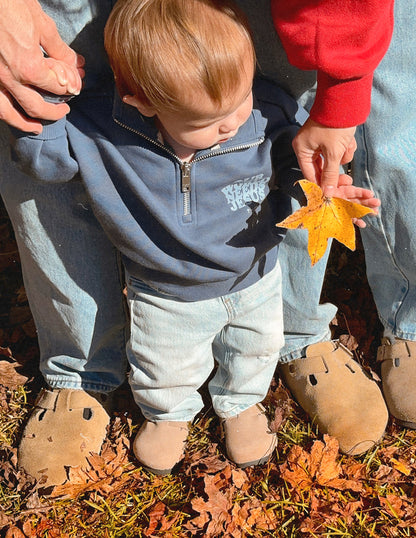 Our World Needs Jesus Kids Half-Zip