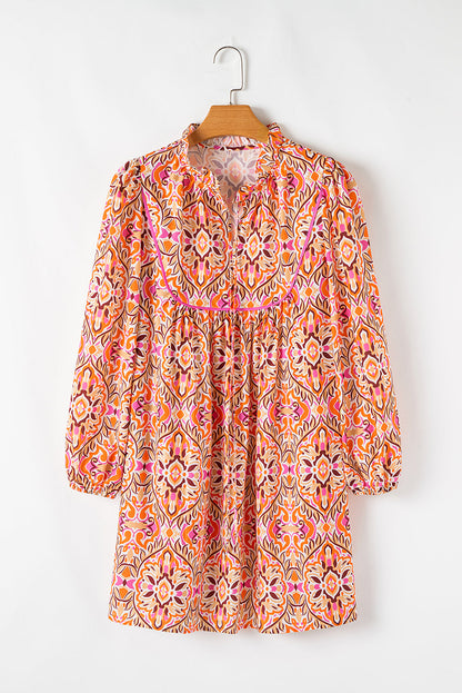 Abstract Long Sleeve Tied Neckline Mini Dress