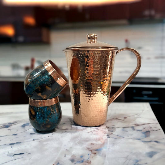 Set of One Shiny Hammered Copper Pitcher with Top and Two Blue Marbled Tumblers