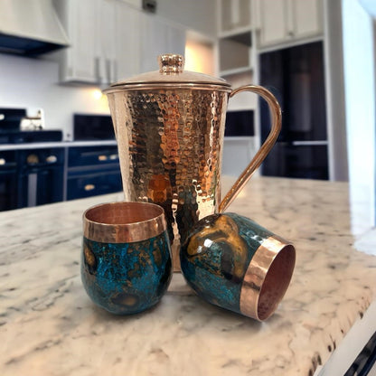 Set of One Shiny Hammered Copper Pitcher with Top and Two Blue Marbled Tumblers